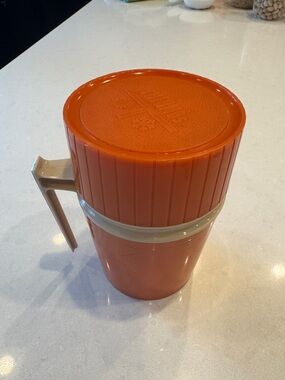Thermos  7002 10 oz vintage Orange Travel thermos with Beige Handle